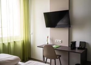 TV a/nebo společenská místnost v ubytování eee Hotel Graz + 21 fotografií