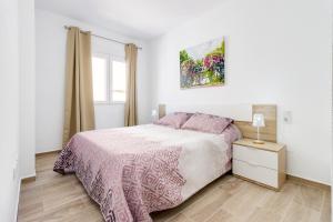 Postel nebo postele na pokoji v ubytování Apartment Cura Beach GALERA + 15 fotografií