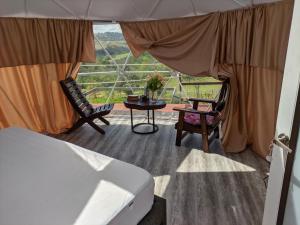 Balkón nebo terasa v ubytování Barichara Glamping + 20 fotografií
