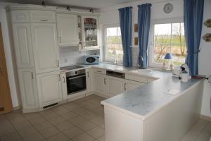Kuchyň nebo kuchyňský kout v ubytování große Ferienwohnung