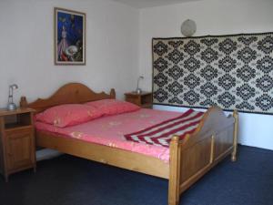 Ein Bett oder Betten in einem Zimmer der Unterkunft Padurea De Argint