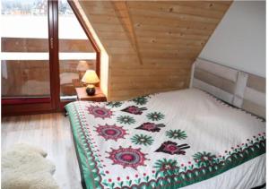 Posteľ alebo postele v izbe v ubytovaní Apartament z basenem + 29 fotografií