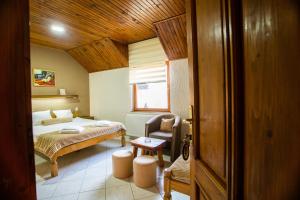 Katil atau katil-katil dalam bilik di Guest House Vila Alexandar