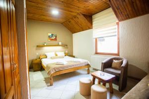 Katil atau katil-katil dalam bilik di Guest House Vila Alexandar