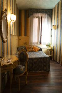 Posteľ alebo postele v izbe v ubytovaní Ca' Morosini 1 & 2