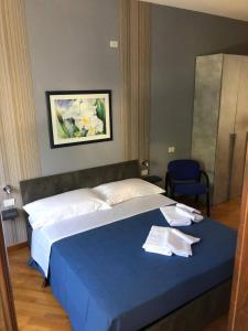 Postel nebo postele na pokoji v ubytování B&B SALento Garden