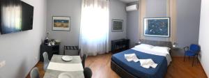 Łóżko lub łóżka w pokoju w obiekcie B&B SALento Garden