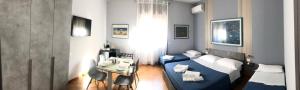 Łóżko lub łóżka w pokoju w obiekcie B&B SALento Garden