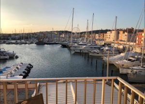 a marina with alot of boats in the water at studio la grande roue VUE MAGNIFIQUE in Cap d'Agde