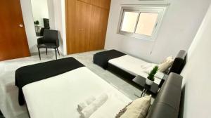 Postel nebo postele na pokoji v ubytování Napa Court 2