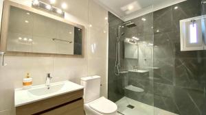 Koupelna v ubytování Napa Court 2 + 6 fotografií