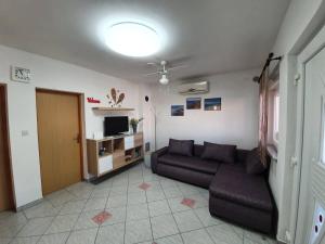 TV a/nebo společenská místnost v ubytování Apartmani Callista