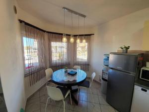 Kuchyň nebo kuchyňský kout v ubytování Apartmani Callista