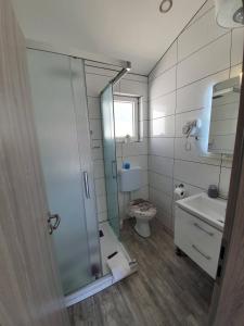 Koupelna v ubytování Apartmani Callista
