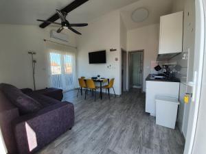 Kuchyň nebo kuchyňský kout v ubytování Apartmani Callista