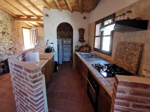 Kuchyň nebo kuchyňský kout v ubytování Casa Cristina + 21 fotografií