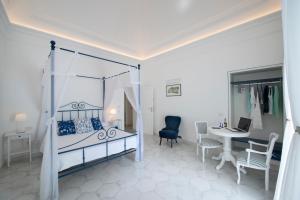 Posteľ alebo postele v izbe v ubytovaní Terrazza Zaffiro