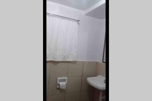 a bathroom with a toilet and a sink at AFFORDABLE BUDGET FRIENDLY STUDIO UNIT in Cebu City +27 photos
