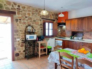 Kitchen o kitchenette sa Villa Huerta Nacimiento