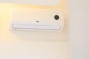 a white video game system on a ceiling at Meghan Home in Catania