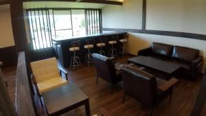 A seating area at FUTO HOUSE -Ippon no Enpitsu-