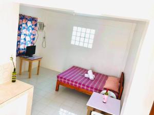 Postel nebo postele na pokoji v ubytování RB Baruiz "Hideaway" Inn - Cebu South
