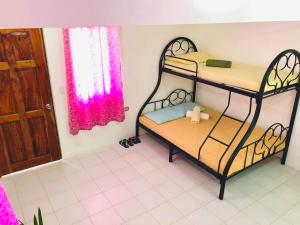 Postel nebo postele na pokoji v ubytování RB Baruiz "Hideaway" Inn - Cebu South