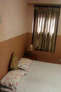 Кровать или кровати в номере Ecotel Guest House