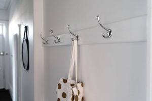 a room with a towel hanging on a wall at Berwick Cottage in Hobart +53 photos