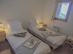 Ένα ή περισσότερα κρεβάτια σε δωμάτιο στο La Couronne