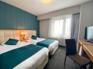 Postel nebo postele na pokoji v ubytování Hotel Sunroute Hikone + 37 fotografií