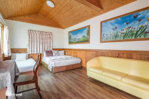 Postel nebo postele na pokoji v ubytování Shan Tyi Homestay