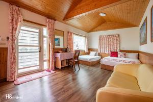 Postel nebo postele na pokoji v ubytování Shan Tyi Homestay