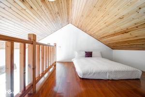 Postel nebo postele na pokoji v ubytování Shan Tyi Homestay