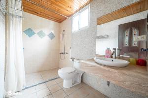 Koupelna v ubytování Shan Tyi Homestay + 37 fotografií