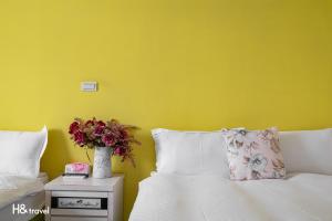 Postel nebo postele na pokoji v ubytování Shan Tyi Homestay