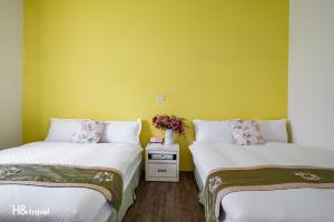Postel nebo postele na pokoji v ubytování Shan Tyi Homestay