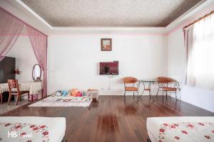 TV a/nebo společenská místnost v ubytování Shan Tyi Homestay