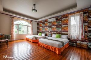 Postel nebo postele na pokoji v ubytování Shan Tyi Homestay