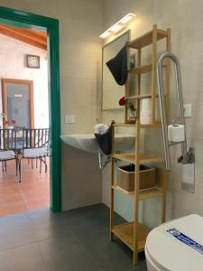 Postel nebo postele na pokoji v ubytování Casa Cueva El Caidero