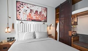 Postel nebo postele na pokoji v ubytování Revier Hotel - Dubai