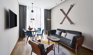 TV a/nebo společenská místnost v ubytování Revier Hotel - Dubai