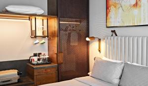 Postel nebo postele na pokoji v ubytování Revier Hotel - Dubai