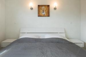 Ένα ή περισσότερα κρεβάτια σε δωμάτιο στο Ferienhaus Helgoland