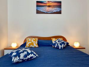 Кровать или кровати в номере Il Riccio Apartment