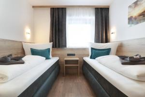 Postel nebo postele na pokoji v ubytování Apart Alina