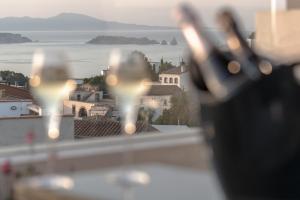 a view of the ocean from a wine glass at Alta House Begur in Begur