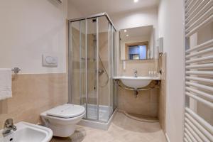 Koupelna v ubytování Hotel Rivus