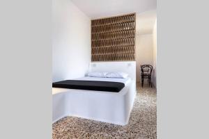 Postel nebo postele na pokoji v ubytování Aerase Apartment