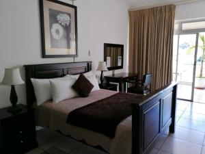 Katil atau katil-katil dalam bilik di Sunset Boulevard Riverlodge